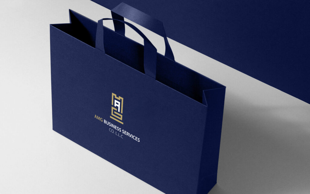 Modern corporate branding elements including typography and color scheme for AMG Business Services